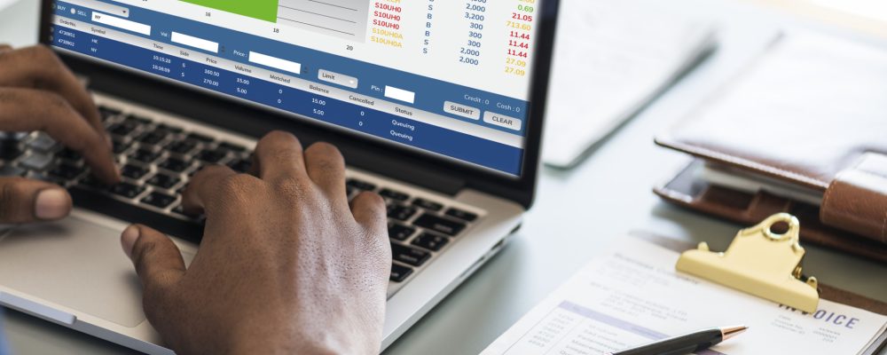 Black businessman using computer laptop